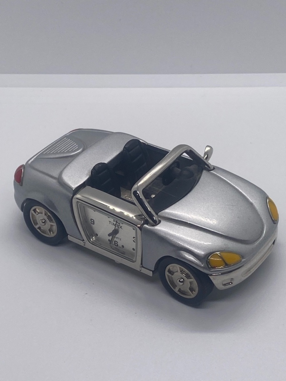 Timex Silver Convertible Car Clock with Yellow Headlight Accents
